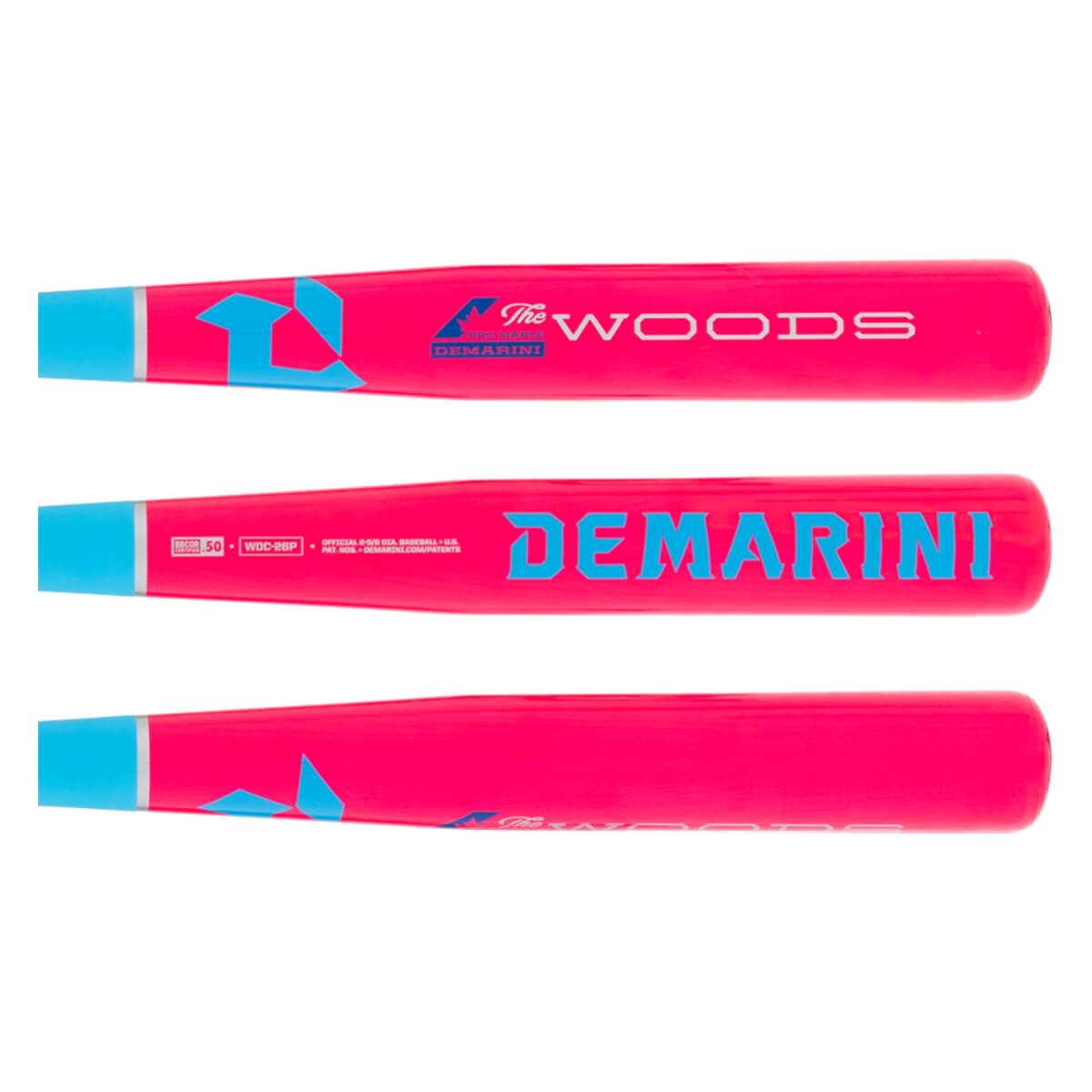 Three side views of a vibrant pink baseball bat with light blue accents, The Woods and DEMARINI branding, and a geometric pattern.