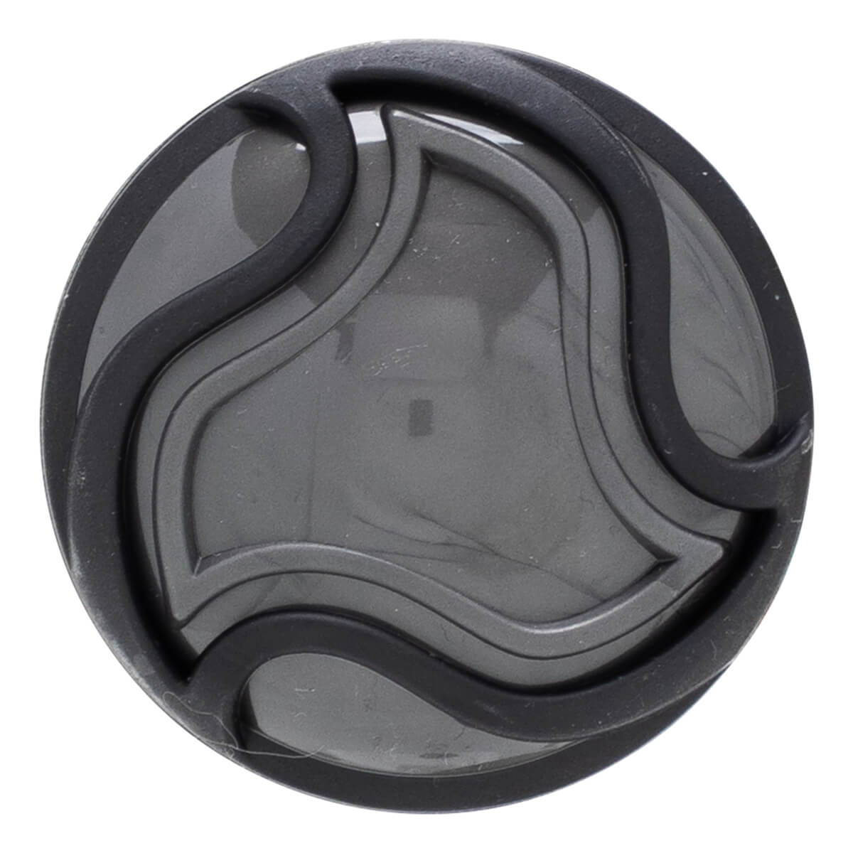 Top-down view of a dark gray circular cap with a black rubber trim and a swirling embossed pattern.