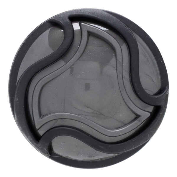 Top-down view of a dark gray circular cap with a black rubber trim and a swirling embossed pattern.