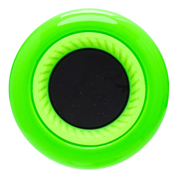 Top-down view of a bright green circular object with a black center and textured light green rings.