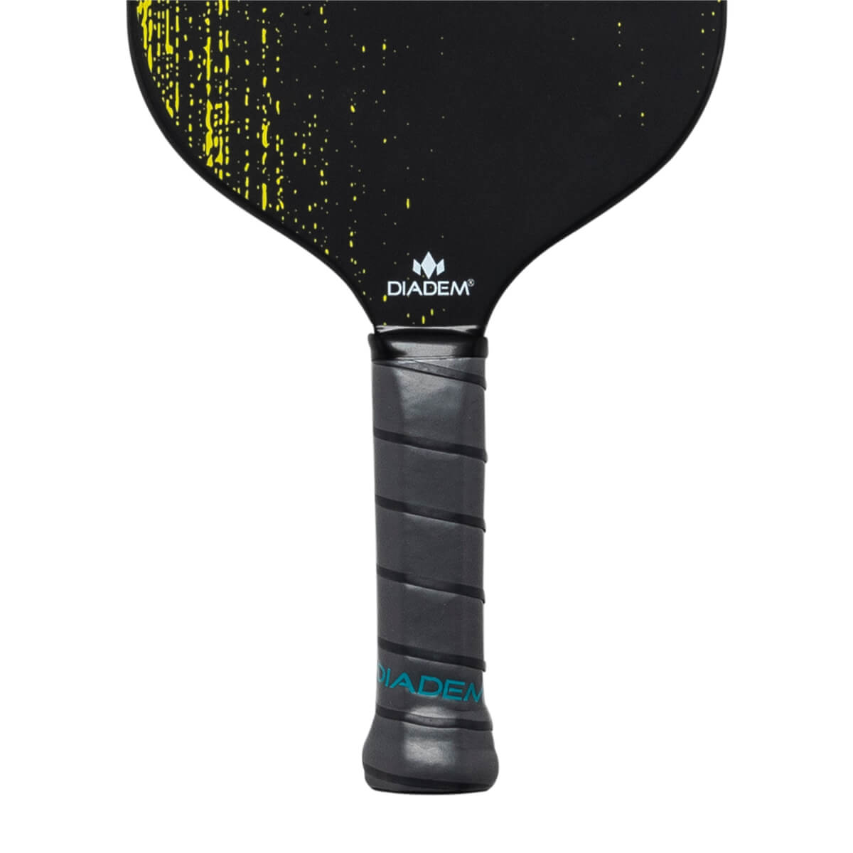 Close-up of a black pickleball paddle with yellow speckles, Diadem logo, and gray grip with blue text.