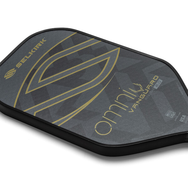 Top-down view of a gray pickleball paddle with gold Selkirk branding and Omni Vanguard 2.0 text.