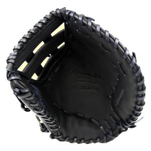 Top-down view of a black Mizuno Pro Series first base mitt with dark blue lacing and embossed branding.
