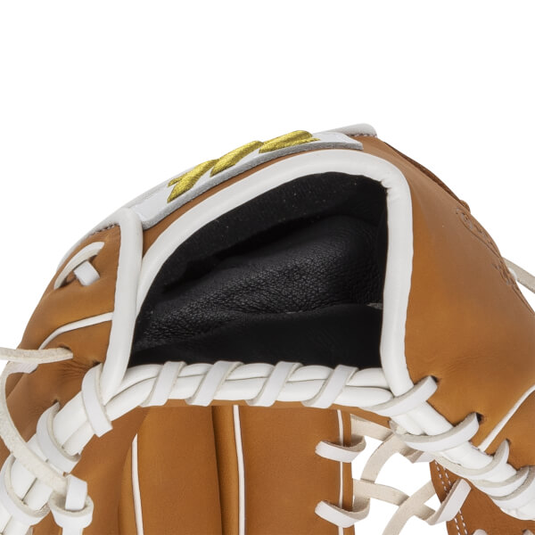 Close-up of the wrist opening on a tan leather glove featuring a black cushioned interior, white lacing, and a partial gold logo on the white wrist strap.