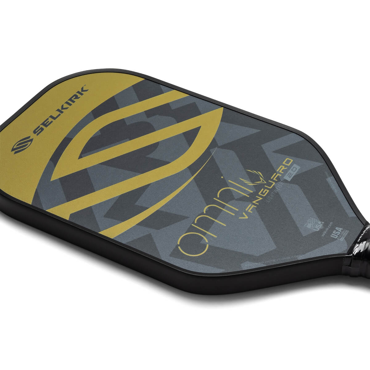 Corner view of a black pickleball paddle with gold and gray geometric design, Selkirk logo, and Omni Vanguard 2.0 text.