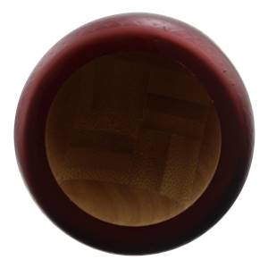 Top-down view of a dark red baseball bat with a visible wood grain interior.
