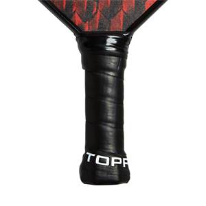 Bottom view of a black pickleball paddle grip with white TOPP text and red/black patterned head.