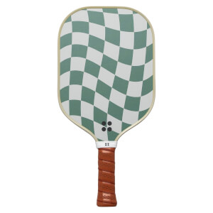Front view of a green and white checkered pickleball paddle with a brown grip and four black dots.