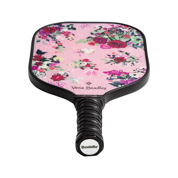 Top-down view of a pink pickleball paddle with a floral pattern, Vera Bradley branding, and a black grip with Baddle logo.