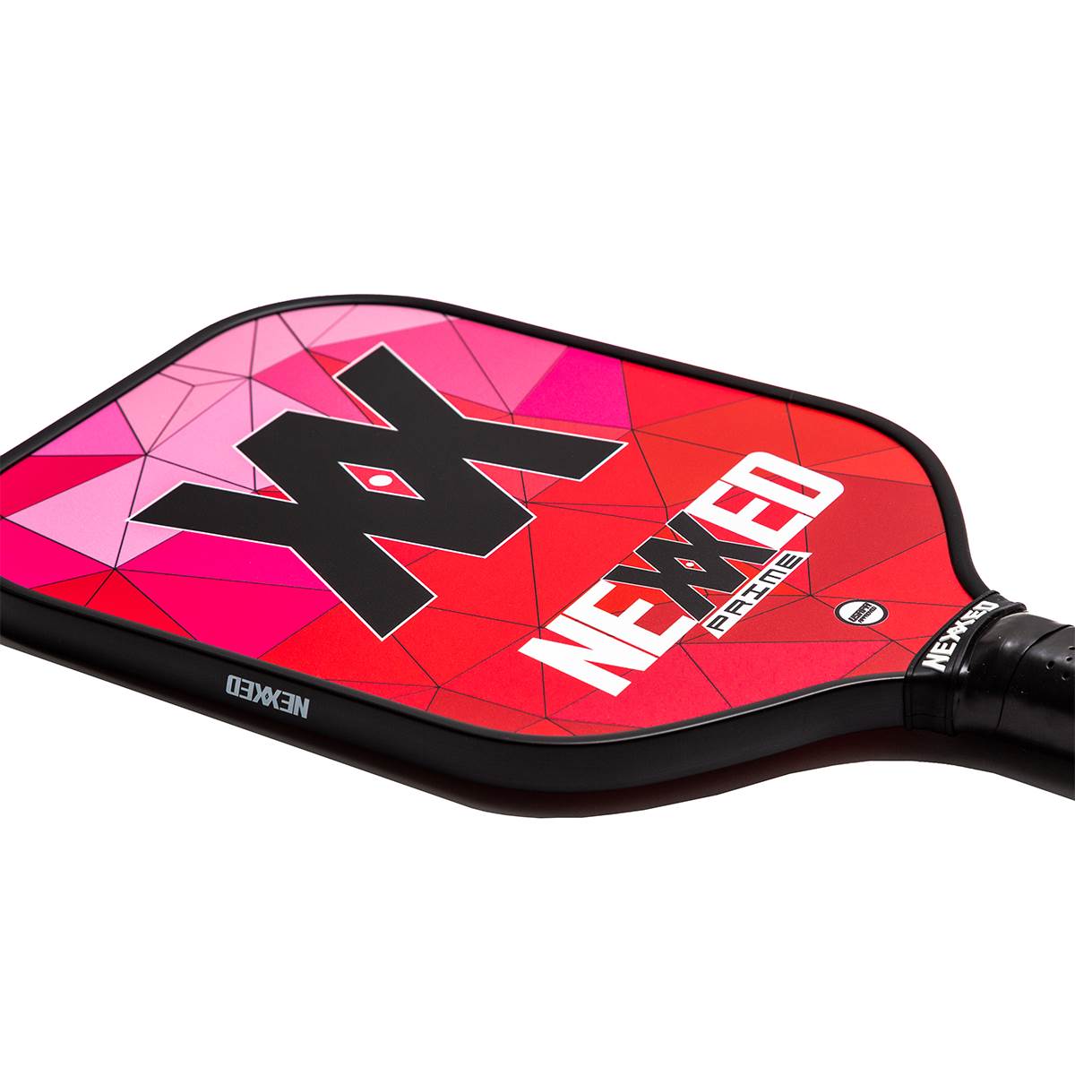 Top-down view of a red pickleball paddle with a black XX logo and NEXXED PRIME text.