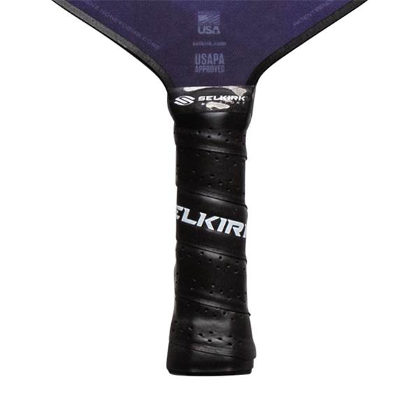 Close-up of a black pickleball paddle grip with white SELKIRK text and USAPA approved logo.