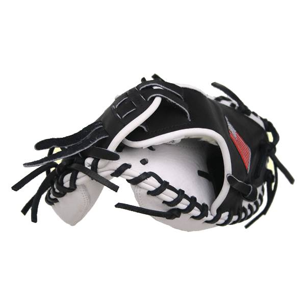 Side view of a black and white catchers mitt with red accents and black lacing.