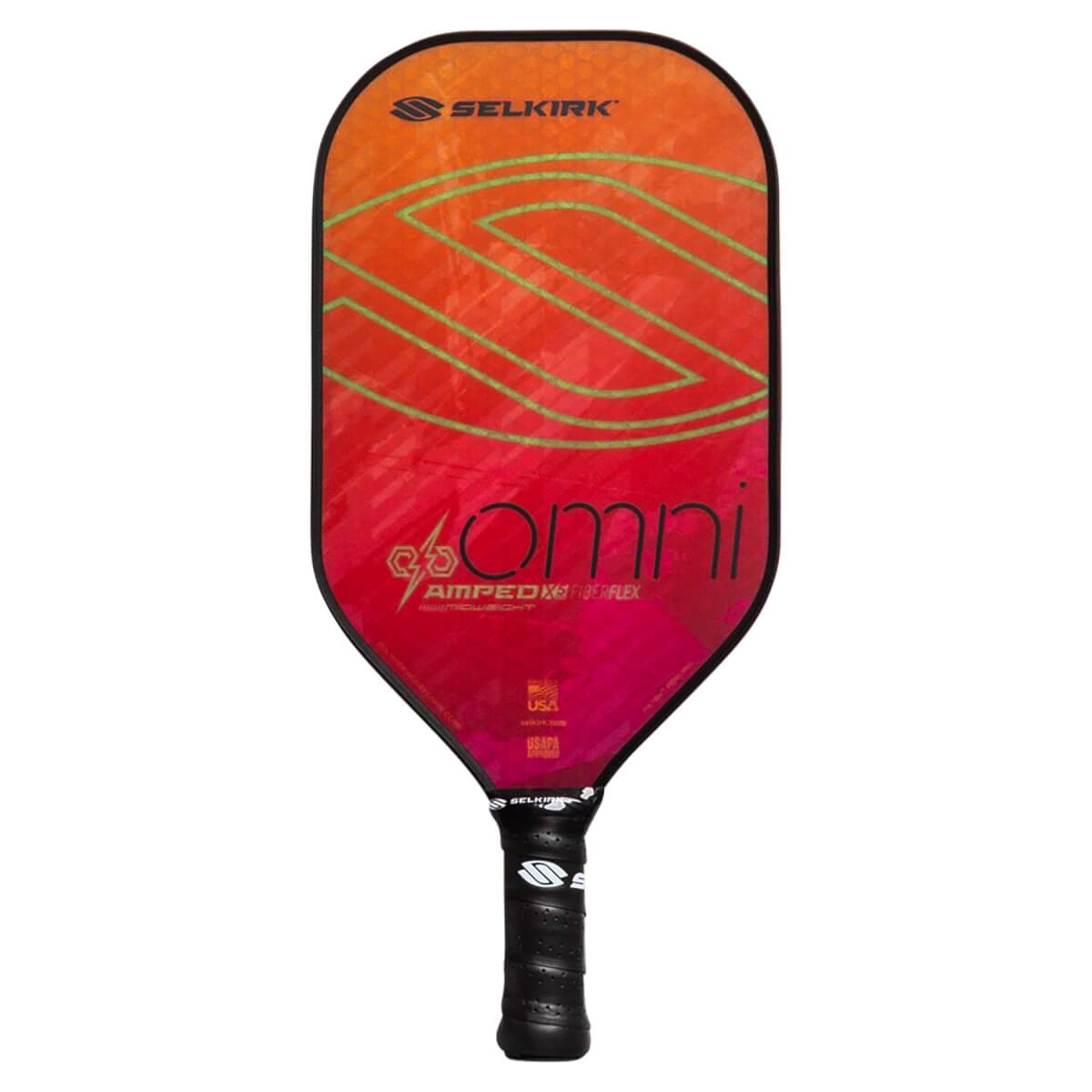 Front view of a red and orange pickleball paddle with green lines, OMNI AMPED text, and a black grip.