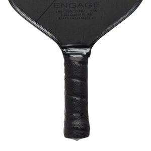 Close-up of a black pickleball paddle grip with perforated texture and ENGAGE text on the paddle face.