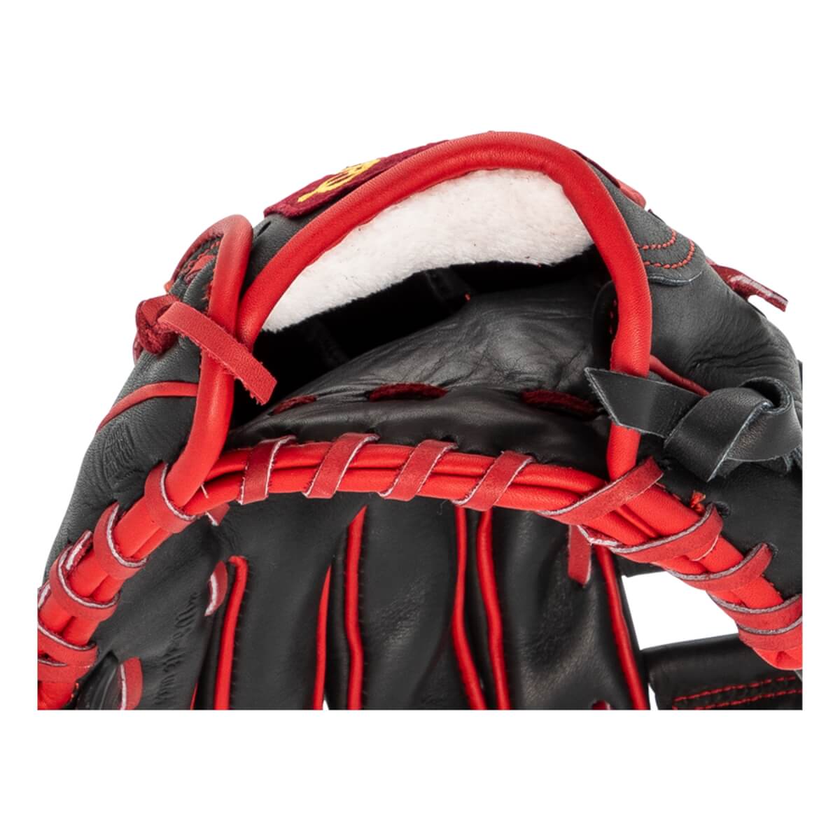 Close-up of a black baseball glove with red lacing, red trim, and white fleece wrist padding.