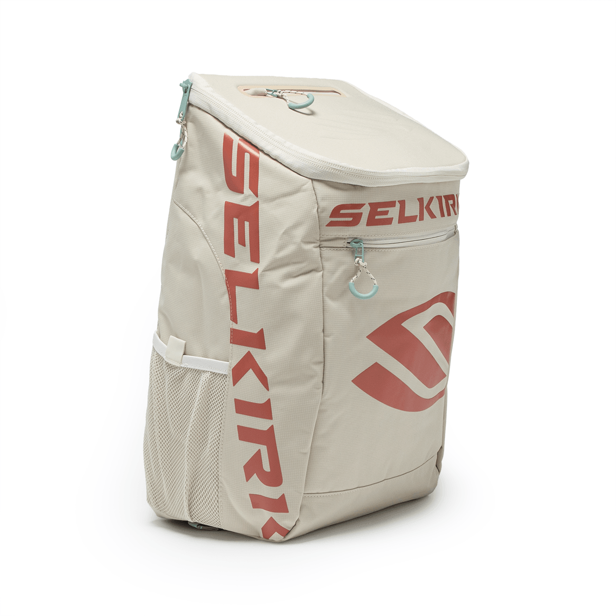 Right side view of a tan backpack with large red "SELKIRK" lettering and a red logo.