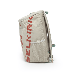 Side view of a light gray backpack with red "SELKIRK" lettering and a mesh side pocket.