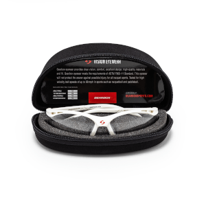 Front view of white safety glasses with a red Gearbox logo, resting in a black case.