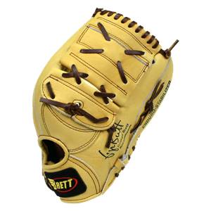 Top-down view of a tan baseball glove with dark brown lacing and BRETT logo.