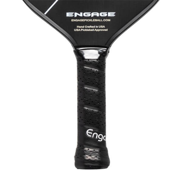 Close-up of a black pickleball paddle grip with perforations and the Engage logo.