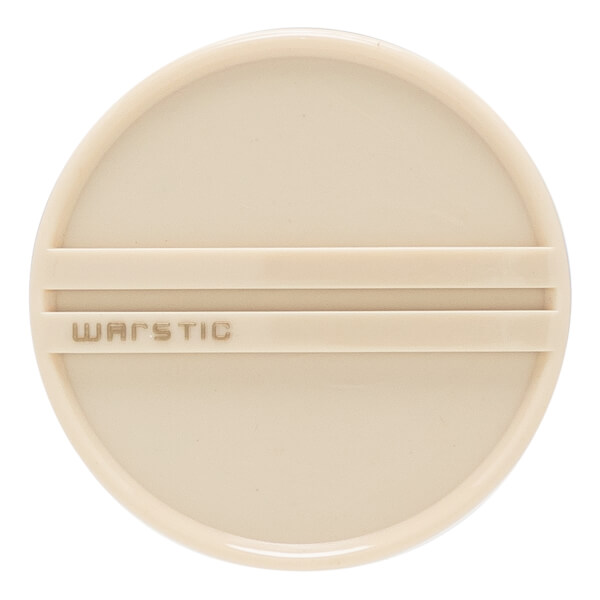 Top-down view of a cream baseball bat end cap with two raised horizontal lines and embossed WARSTIC text.