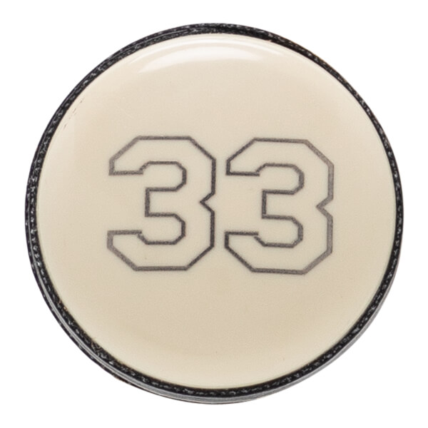Top-down view of an off-white baseball bat end cap with a black rim and large outlined number 33.