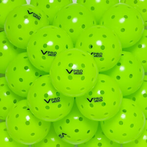 Close-up of lime green pickleballs with V PRO FLIGHT logo and circular perforations.