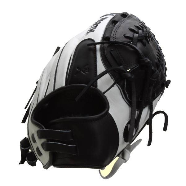 Top-down view of a white and black softball glove with black lacing and a black wrist strap.