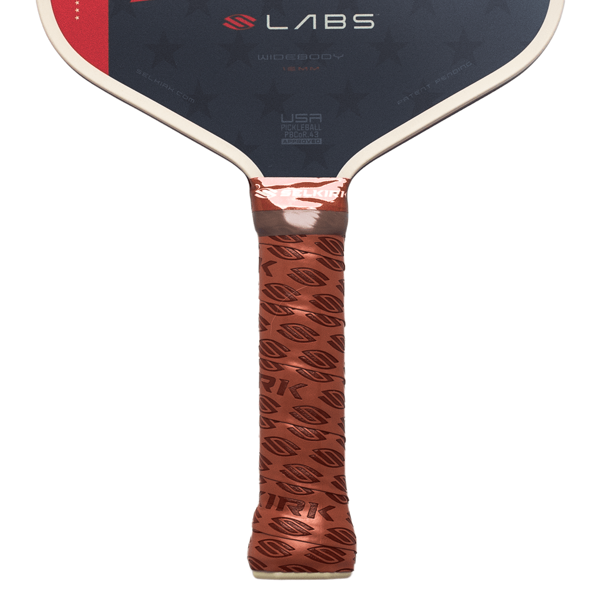 Front close-up of a pickleball paddle handle with a bronze patterned grip and a dark blue face featuring "LABS," "SELKIRK," and "WIDEBODY" text.
