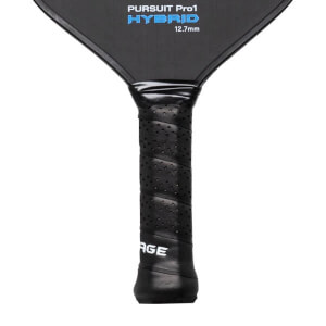 Close-up of a black pickleball paddle with PURSUIT Pro1 HYBRID text on the face and a perforated grip displaying AGE.