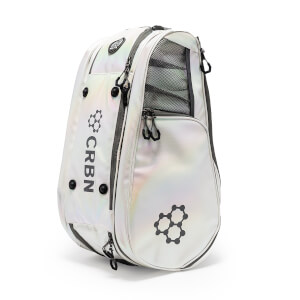 Iridescent white pickleball bag with black zippers, a mesh pocket, and a molecular logo. CRBN is printed vertically on the side.
