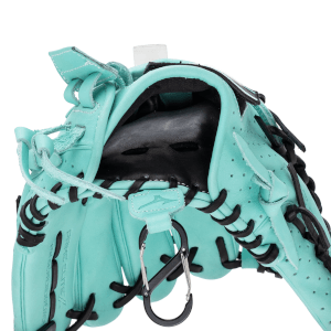 Close-up view of a teal baseball glove with black lacing, showing the "PRIME ELITE II" text and a carabiner clip.