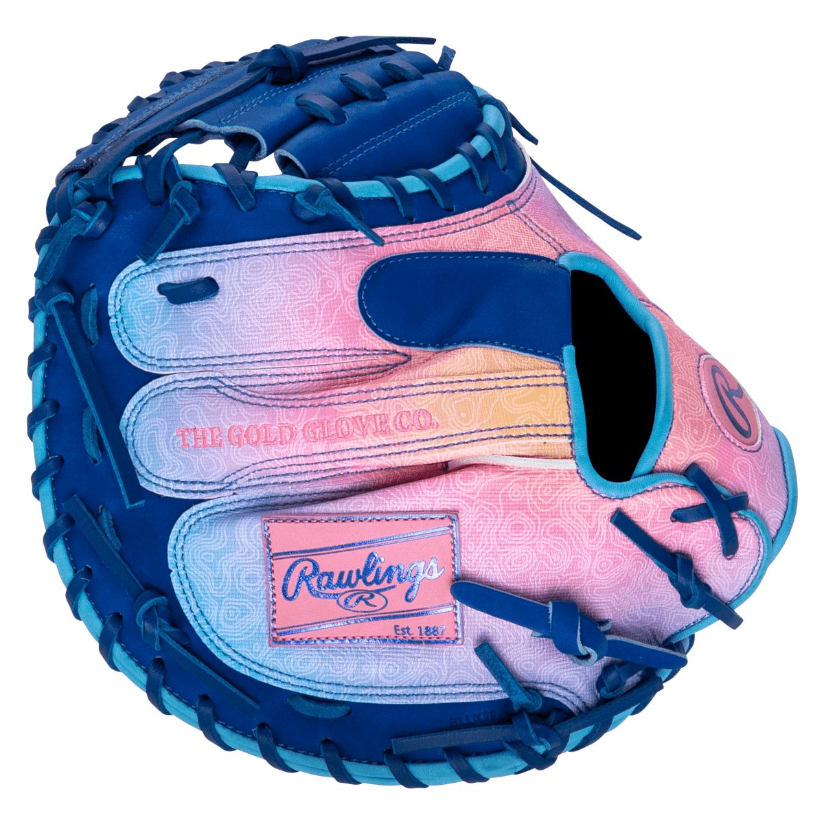 Palm view of a blue baseball glove with a pink, purple, and yellow gradient palm featuring a "Rawlings Est. 1887" patch and "The Gold Glove Co." text.