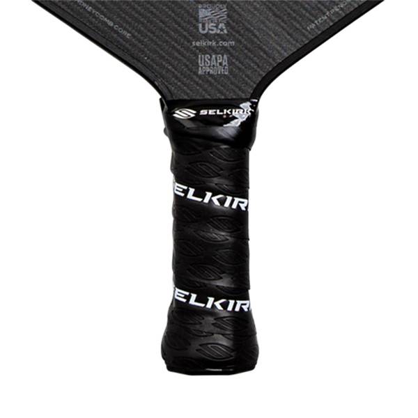 Close-up of a black pickleball paddle grip with white ELKIR branding and a textured surface.