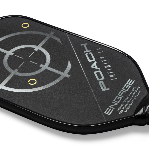 Close-up of a black pickleball paddle with a target design, POACH INFINITY LX, and ENGAGE branding.