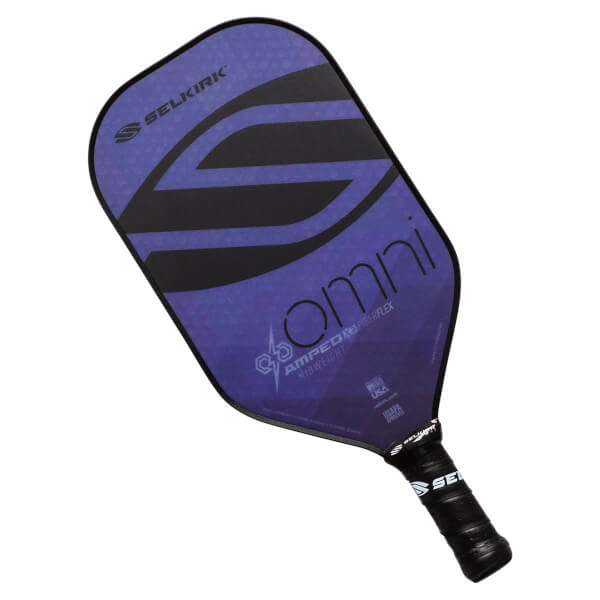 Top-down view of a purple Selkirk pickleball paddle with black S logo, omni text, and textured grip.