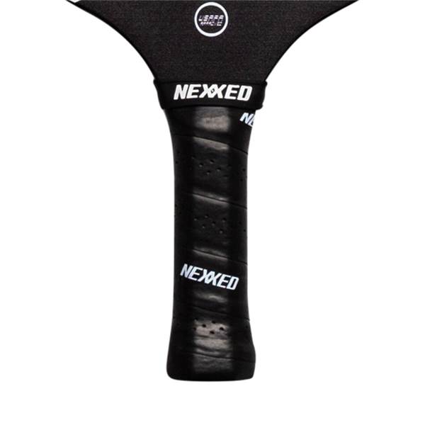 Close-up of a black pickleball paddle grip with perforated texture and white Nexxed branding.