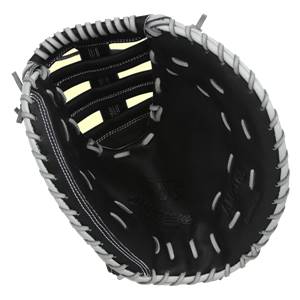 Top-down view of a black catchers mitt with white lacing and Akadema branding.