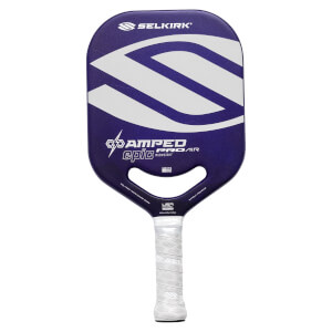 Front view of a purple pickleball paddle with white Selkirk AMPED PRO AIR epic branding, a handle cutout, and a white wrapped grip.