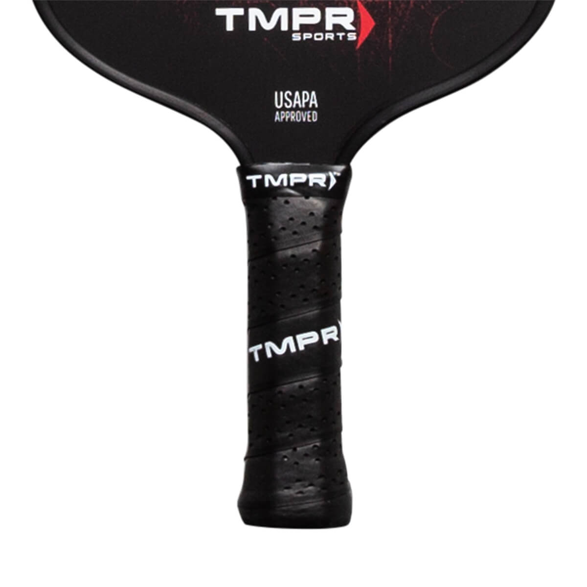 Close-up of a black pickleball paddle grip with perforations and TMPR branding.