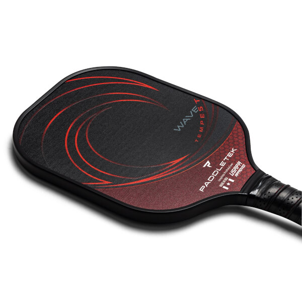 Top-down view of a black and red pickleball paddle with WAVE TEMPEST and PADDLETEK text.