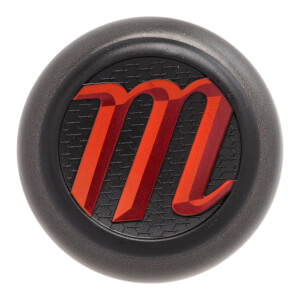 Top-down view of a black baseball bat end cap with a red m logo and honeycomb pattern.