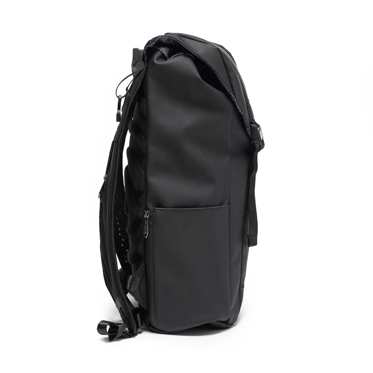 Side view of the matte black Project Prestige backpack showing the padded straps, zippered side pocket, and fold-over top.