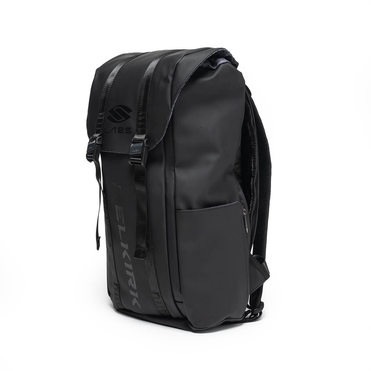 Corner view of a black backpack with two buckled straps over a top flap featuring the "S LABS" logo, with "SELKIRK" embossed vertically down the front.