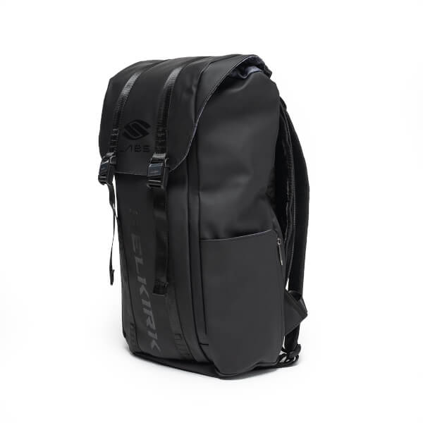 Corner view of a black backpack with two buckled straps over a top flap featuring the "S LABS" logo, with "SELKIRK" embossed vertically down the front.