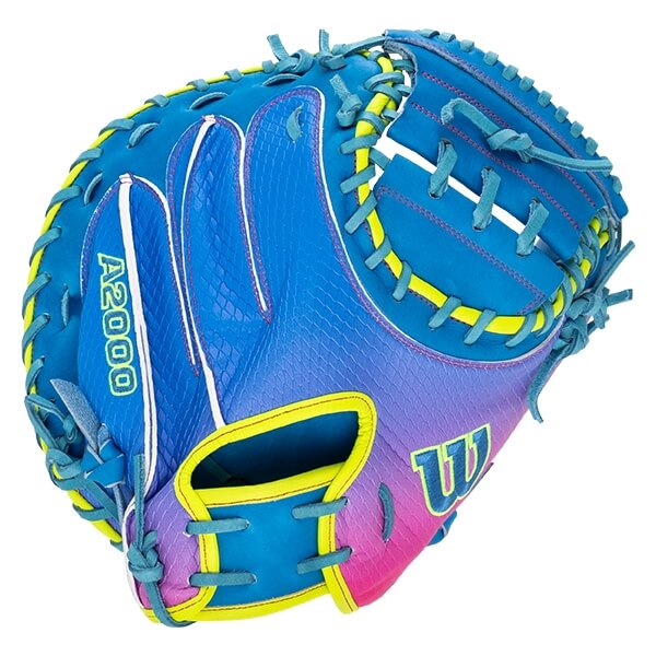 Back view of a blue and pink gradient catcher's mitt with yellow accents and snakeskin texture, featuring "A2000" and a Wilson "W" logo.