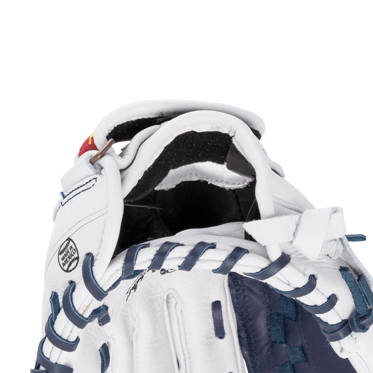 Top-down view of a white baseball glove, showing blue lacing and a "Made in Mexico" stamp on the heel.