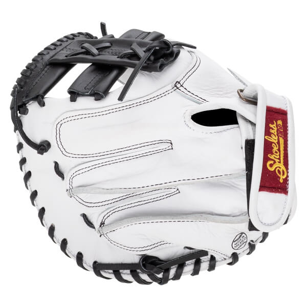 Back view of a white leather catcher's mitt with black laces, a red "Shoeless" brand patch on the wrist strap, and a circular "MADE IN MEXICO" stamp.