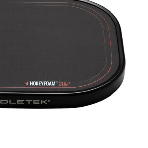 Corner view of the Paddletek TKO-X paddle showing "HONEYFOAM™ TKO-X 16MM" and "PADDLETEK®" text.