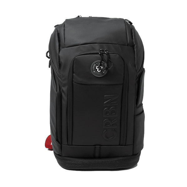 Front view of a black backpack with a circular "MAGNETIC" emblem and raised "CRBN" lettering.